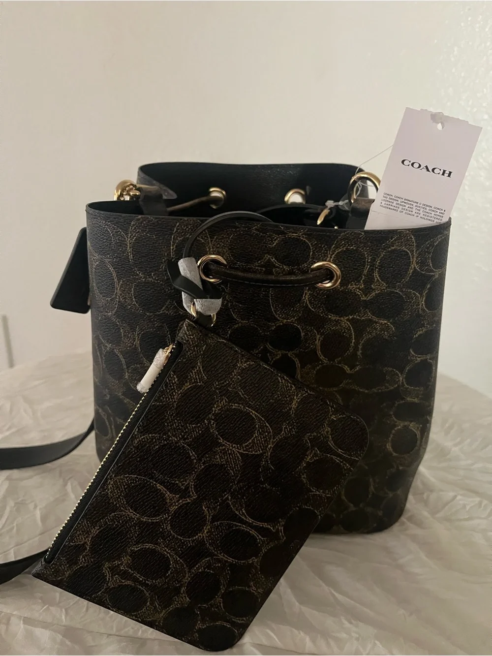 Rowan Bucket Bag in Loved Signature Coated Canvas